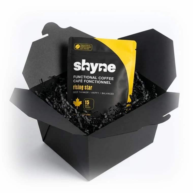 Black gift box with a single Shyne coffee pouch